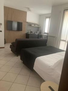 Postel nebo postele na pokoji v ubytování Jasmine garden apartment