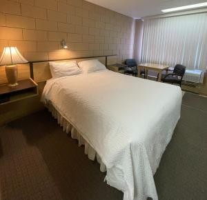 Voodi või voodid majutusasutuse Rest Easy Motel toas