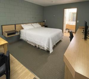 Voodi või voodid majutusasutuse Rest Easy Motel toas