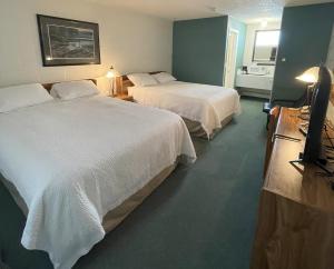 Voodi või voodid majutusasutuse Rest Easy Motel toas
