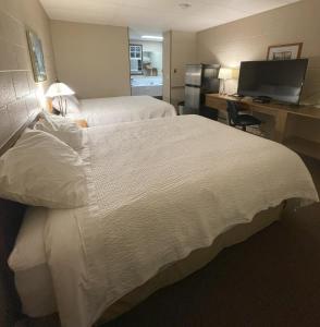 Voodi või voodid majutusasutuse Rest Easy Motel toas