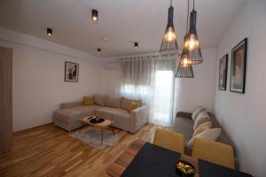 Posezení v ubytování Petković apartmani 31 STUDIO + 35 fotografií