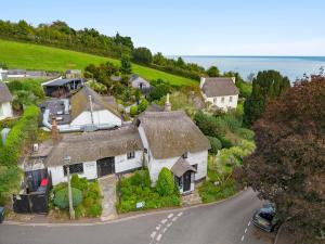 an aerial view of a house with a road at Stunning Sea View Whole Home In Torbay Close To Beach in Torquay
