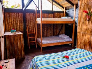 Postel nebo postele na pokoji v ubytování Ecohotel Riomar Mecana