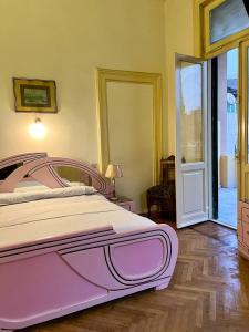 Postel nebo postele na pokoji v ubytování Philo Hotel