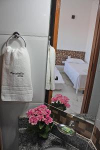 Postel nebo postele na pokoji v ubytování Hotel Portobello