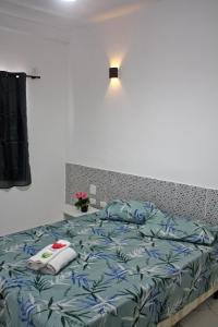 Postel nebo postele na pokoji v ubytování Hotel Portobello