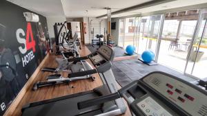 a gym with several treadmills and a treadmill at S4 Hotel - Studio particular - Apt 620 - Águas Claras in Brasilia