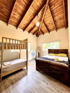Postel nebo postele na pokoji v ubytování Villa escondida