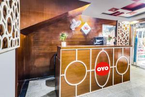 The lobby or reception area at Super OYO Flagship Qualia Hotel Dilsukhnagar Near Dilsukhnagar Metro Station
