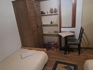 Łóżko lub łóżka w pokoju w obiekcie Apartman Zuki