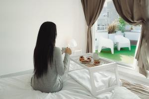 Posteľ alebo postele v izbe v ubytovaní San Michele Luxury Rooms