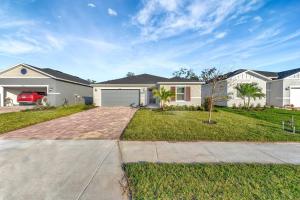 a large white house with a driveway at Serene Sarasota Residence * By th Beach & Airport! in Sarasota