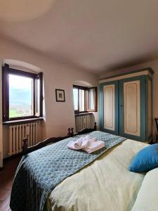Postel nebo postele na pokoji v ubytování La casa di MonAmì
