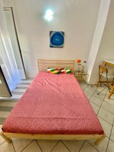 Tempat tidur dalam kamar di Greg´s Apartament Milano