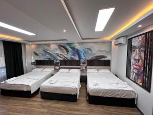 Krevet ili kreveti u jedinici u okviru objekta HOTEL by Samarkand travel agency
