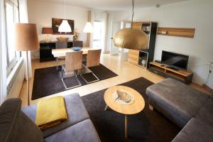 a living room with a couch and a table at Villa with great pool dog friendly in Vinarós