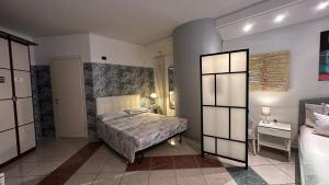 Postel nebo postele na pokoji v ubytování Amarin Pisa Room