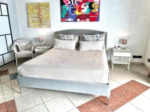 Postel nebo postele na pokoji v ubytování Amarin Pisa Room