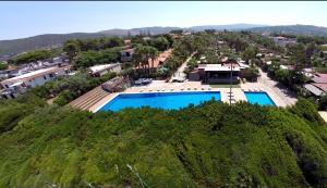 an aerial view of a villa with a swimming pool at Villaggio Silvia in Castellabate