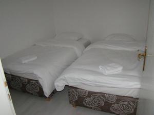 Guest House Zamak tesisinde bir odada yatak veya yataklar