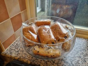 a bowl of food sitting on top of a counter at The Jays Guest House in Aberdeen