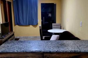 Imagen de la galería de casa,ar condicionado,suíte e garagem no major prates, en Montes Claros