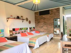 Postel nebo postele na pokoji v ubytování Mamatina Hotel