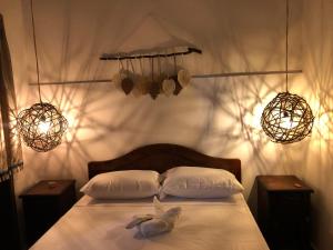Ein Bett oder Betten in einem Zimmer der Unterkunft Rustico Hostel Barichara