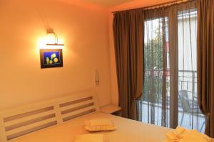 Ένα ή περισσότερα κρεβάτια σε δωμάτιο στο Stela Guest House