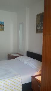 Postel nebo postele na pokoji v ubytování Guest House Jole