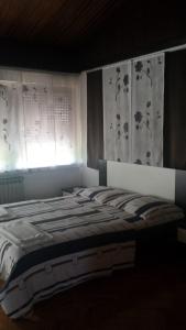 Postel nebo postele na pokoji v ubytování Guest House Jole