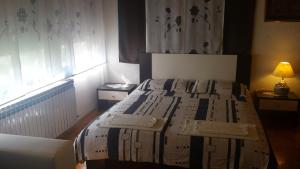 Postel nebo postele na pokoji v ubytování Guest House Jole
