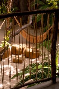 a bird cage with some food inside of it at Villa Mango Jeri in Jericoacoara