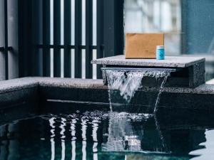 Bazén v ubytování Tengchong Jingge Banshan Hot Spring Hotel nebo v jeho okolí