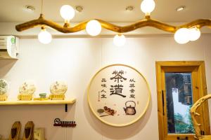Kuvagallerian kuva majoituspaikasta 小喜屋（西湖街店）, joka sijaitsee kohteessa Qingpu