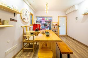 Majoituspaikan 小喜屋（西湖街店） keittiö tai keittotila