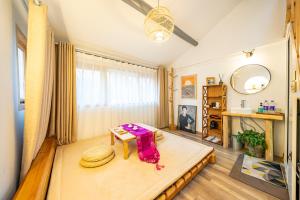 Vuode tai vuoteita majoituspaikassa 小喜屋（西湖街店）