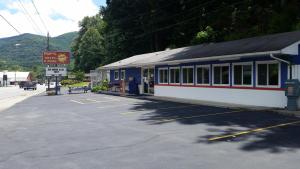 a train station on the side of a street at A Holiday Motel - Maggie Valley in Maggie Valley