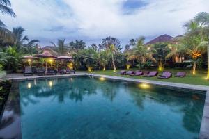 Bazén v ubytování Pertiwi Bisma Ubud nebo v jeho okolí