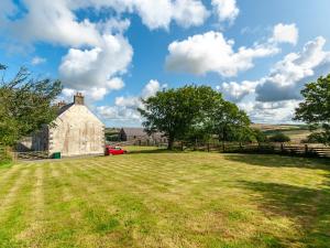 an old barn in the middle of a field at Trefrane House-qc1119 in Roch