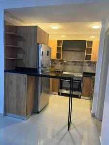 Kuchyňa alebo kuchynka v ubytovaní High quality apartment Madinty