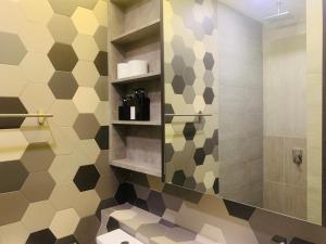 Koupelna v ubytování Ceylonz Suites by ROOMY