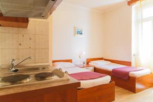 Posteľ alebo postele v izbe v ubytovaní Villa Spalatina