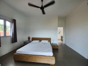 Postel nebo postele na pokoji v ubytování MaiNguyenVilage