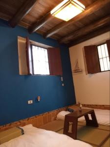 Postel nebo postele na pokoji v ubytování Artistic Nest