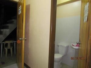Baðherbergi á TRIPLE JS INN-SAGADA