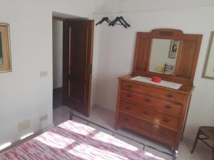 A bed or beds in a room at A ca' du Risso - Appartamento - Sea & outdoor for families, bikers and climbers