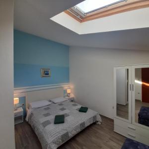 Ένα ή περισσότερα κρεβάτια σε δωμάτιο στο Beach pearl 2