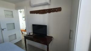 TV a/nebo společenská místnost v ubytování Playa Blanca Sea View